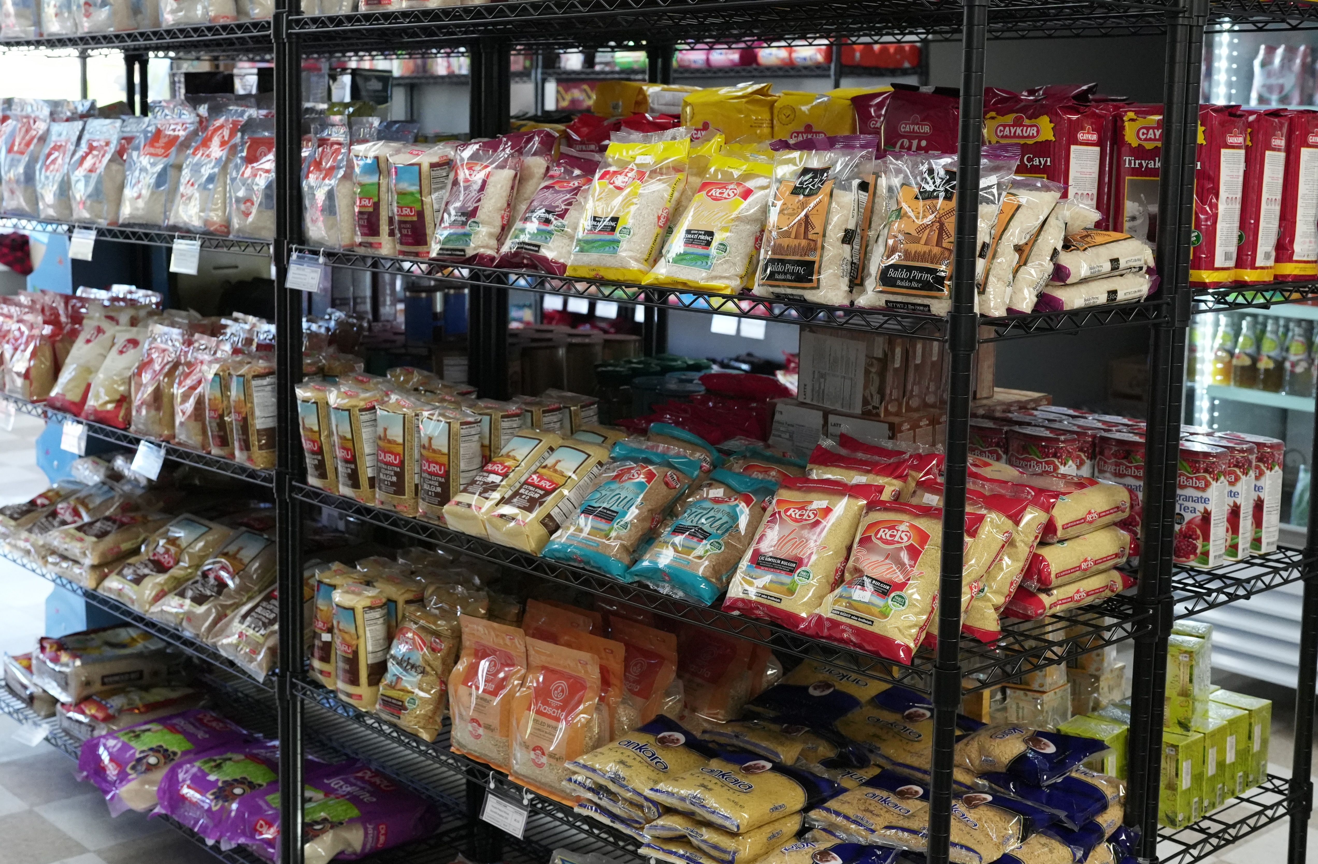 Shelves of rice, bulgur, lentils, and Çaykur tea